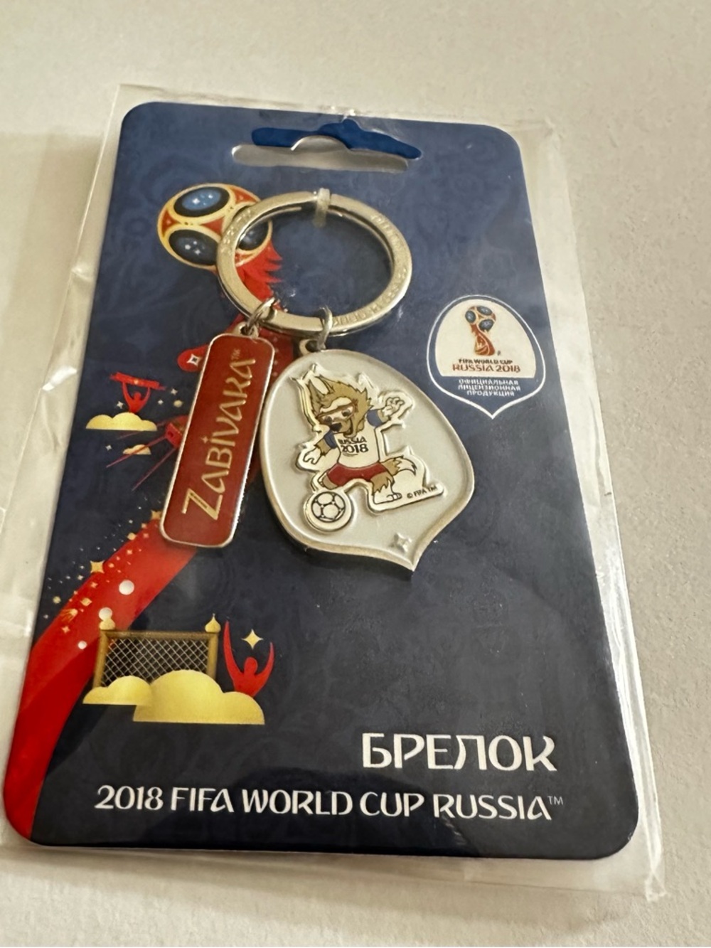 2018 FIFA World Cup Russia Zabivaka Keychain - Silver & Red
